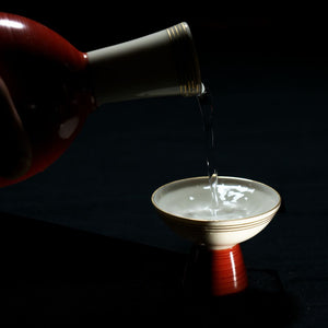 Why Is Sake Poured Until It Overflows?